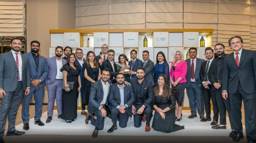 Real estate professionals from Homes 4 Life collaborating with Emaar, a renowned property developer